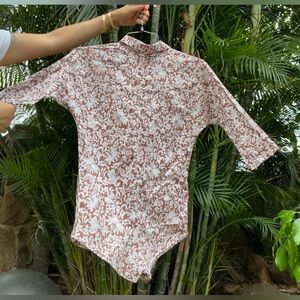 Acacia floral print romper + Acacia collab hat